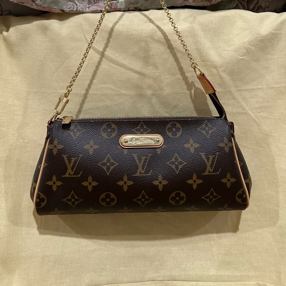 Authentic Monogram Eva Clutch - Perfect Condition